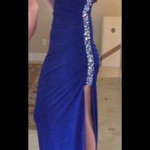 Royal blue, with bling down the slit leg side.